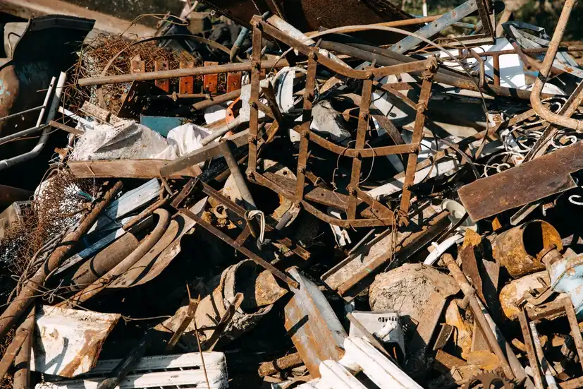 Pile of rusty mixed metal scrap ready for recycling in Brisbane
